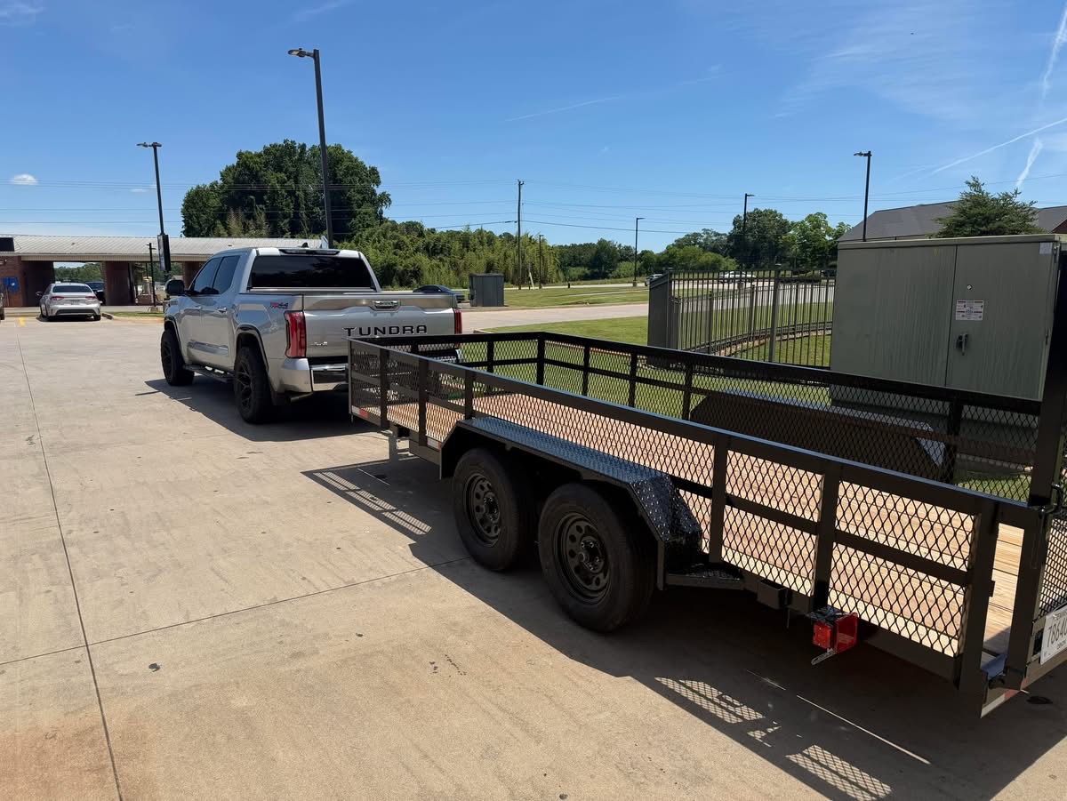 Patriot Hauling truck and trailer ready for a junk removal job in Upstate SC